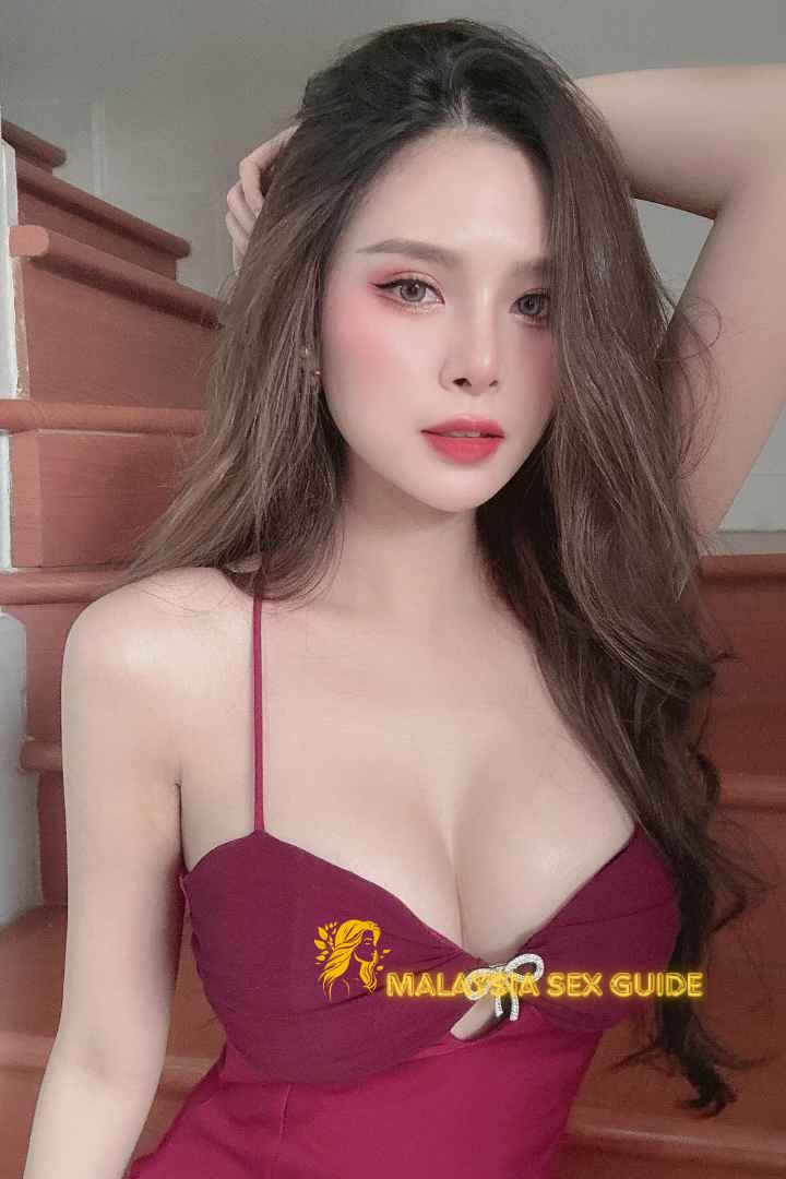 Attractive KL girl in a red dress.
