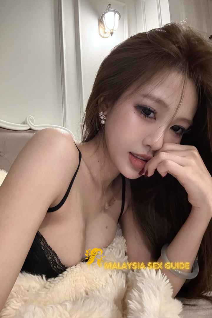 Attractive young woman in black lingerie