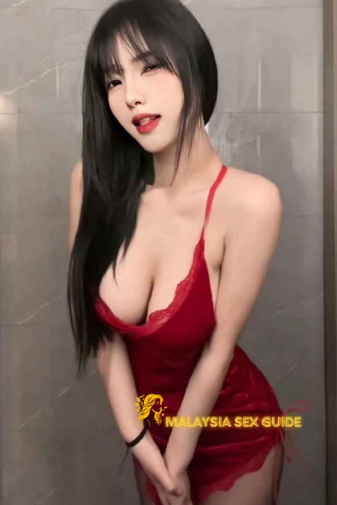 Attractive woman in a red dress. Malaysia Sex Guide