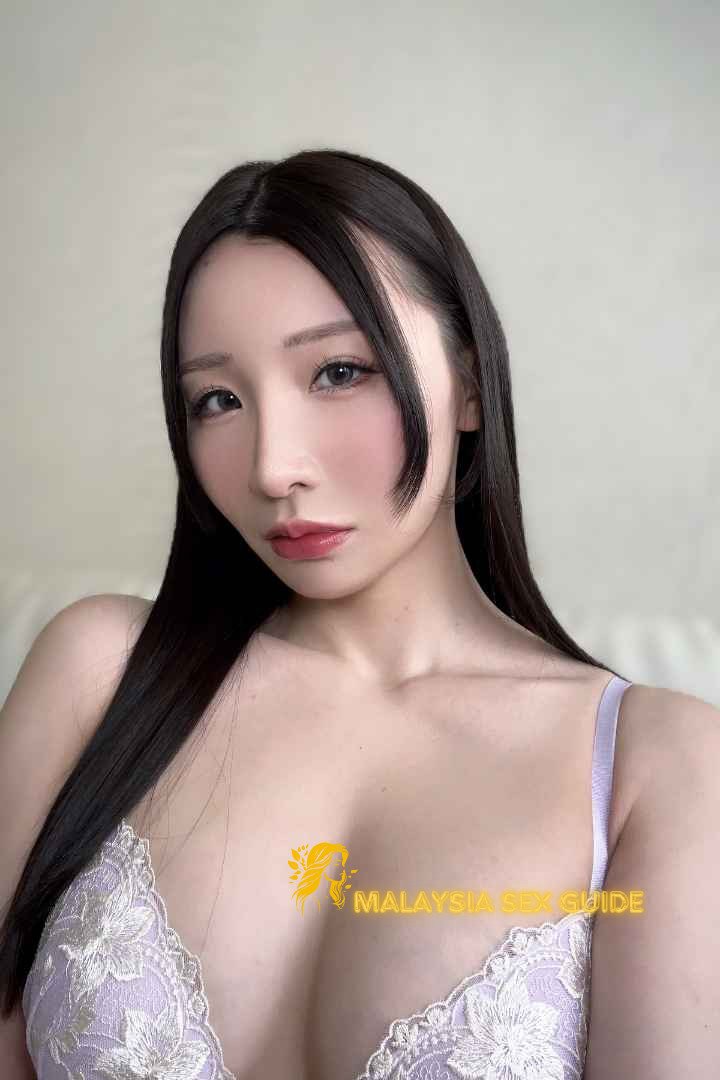 Attractive young woman in lacy lingerie. Malaysia sex guide.